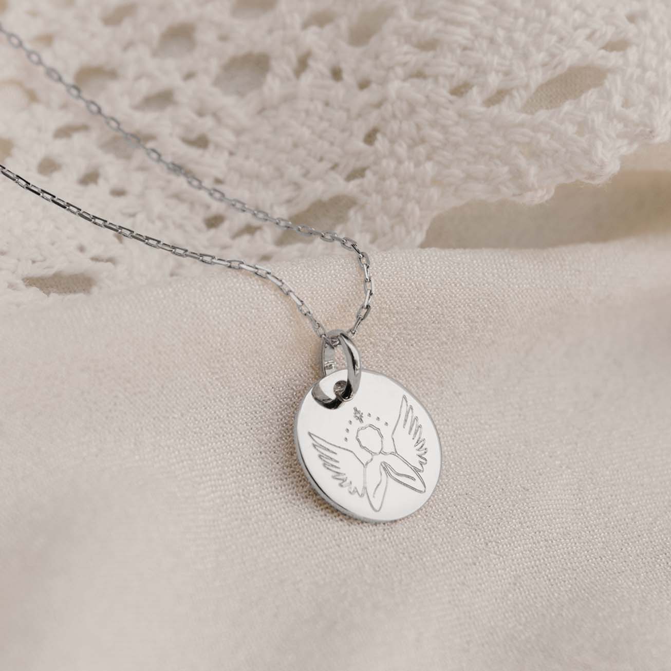 Medalla de bautizo <i>Angel bondadoso</i> plata