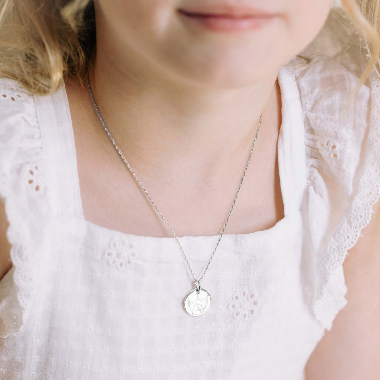 Medalla de bautizo <i>Angel bondadoso</i> plata