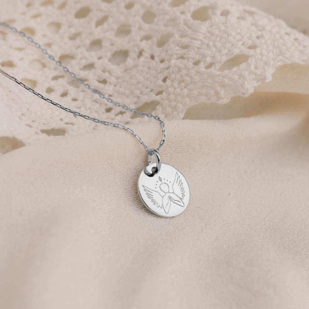 Medalla de bautizo <i>Angel bondadoso</i> plata