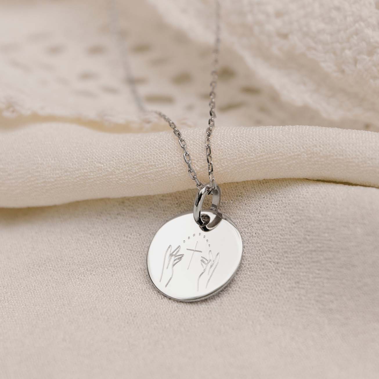 Medalla de bautizo <i>Manos estrelladas</i> plata 